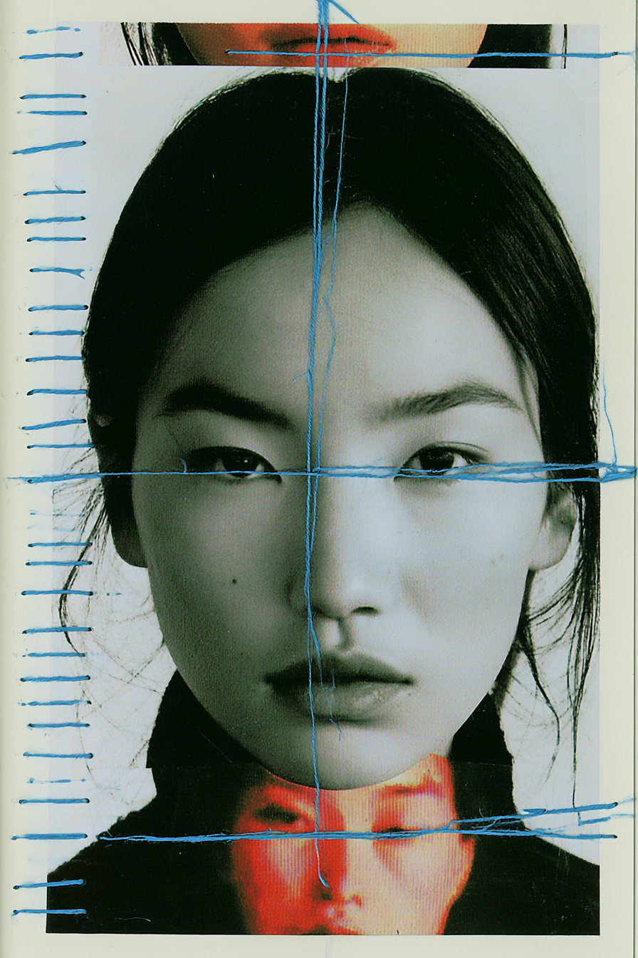 A black and white close-up portrait of an Asian woman with blue thread stitched across the image and a fragmented colored portrait overlapping her neck area