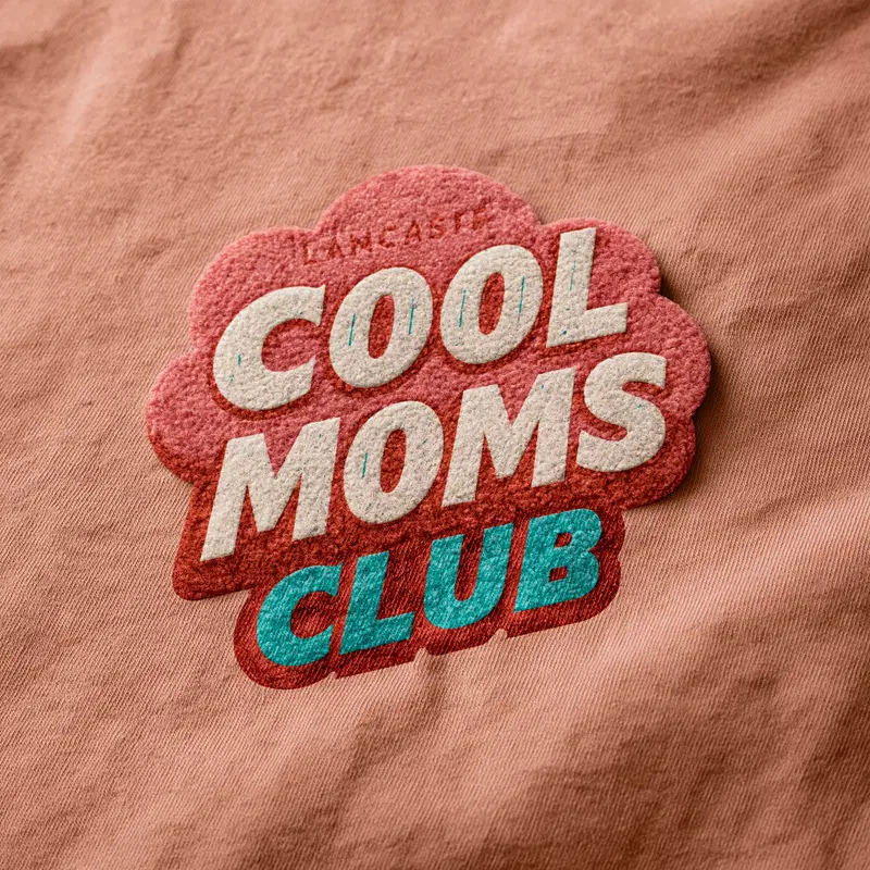 Retro style graphic design with Cool Moms Club text on fabric