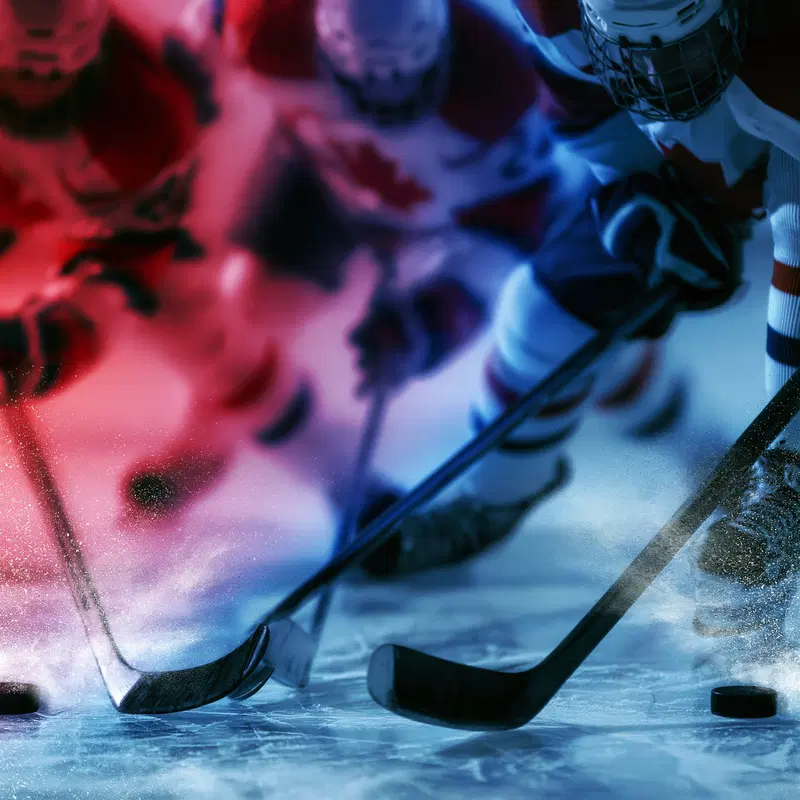 Dynamic action shot of ice hockey players competing on the rink