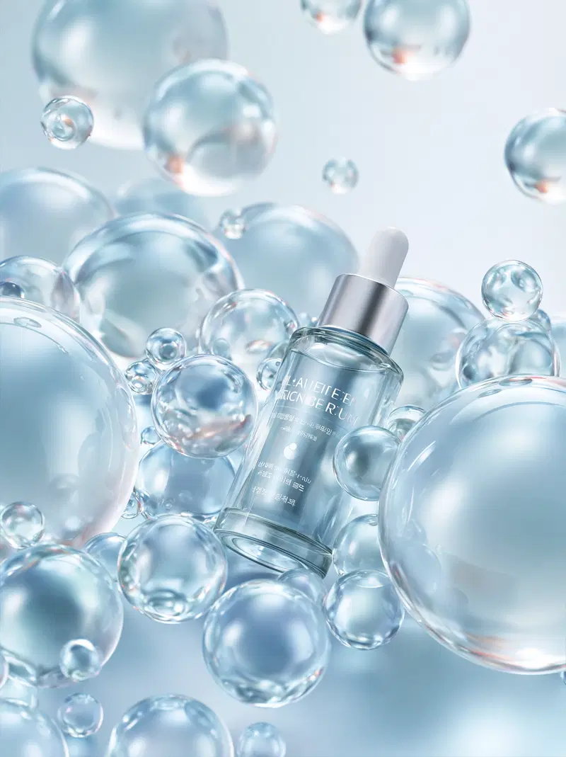 Dropper Bottle with Glass Bubbles in a Surreal Floating Composition