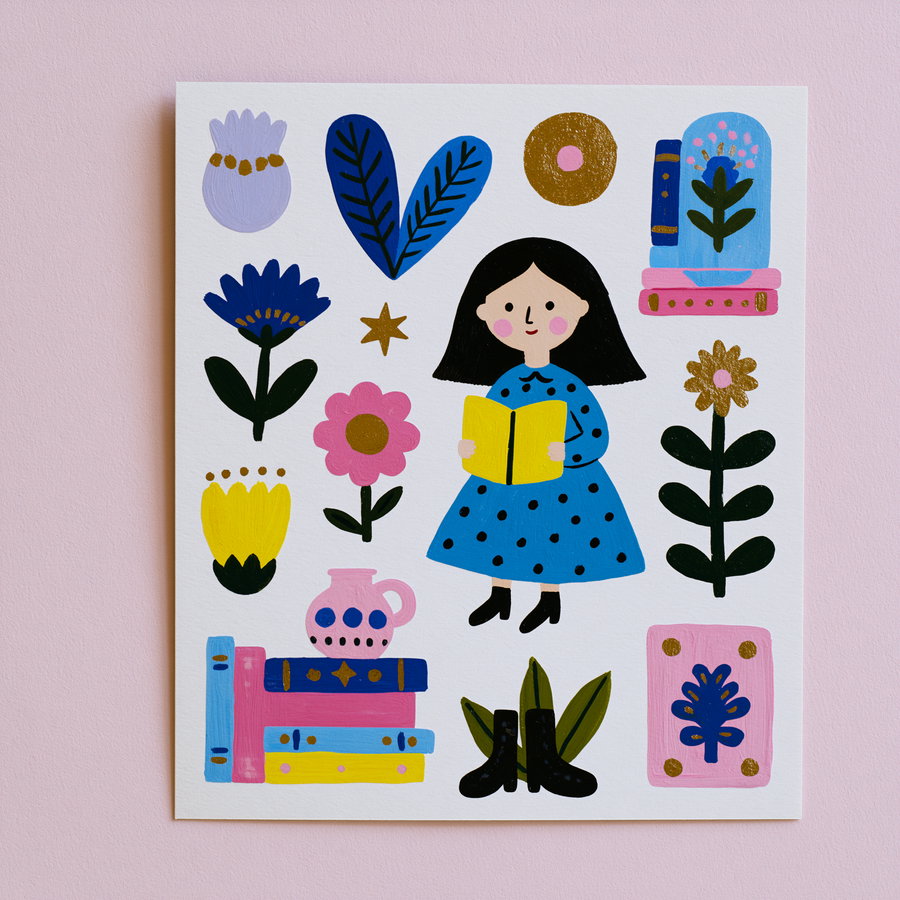 A colorful illustration featuring a girl with black hair wearing a blue polka dot dress reading a yellow book, surrounded by various flowers, leaves, books, a pink vase, black boots, and decorative elements on a white background with a pink surface underneath