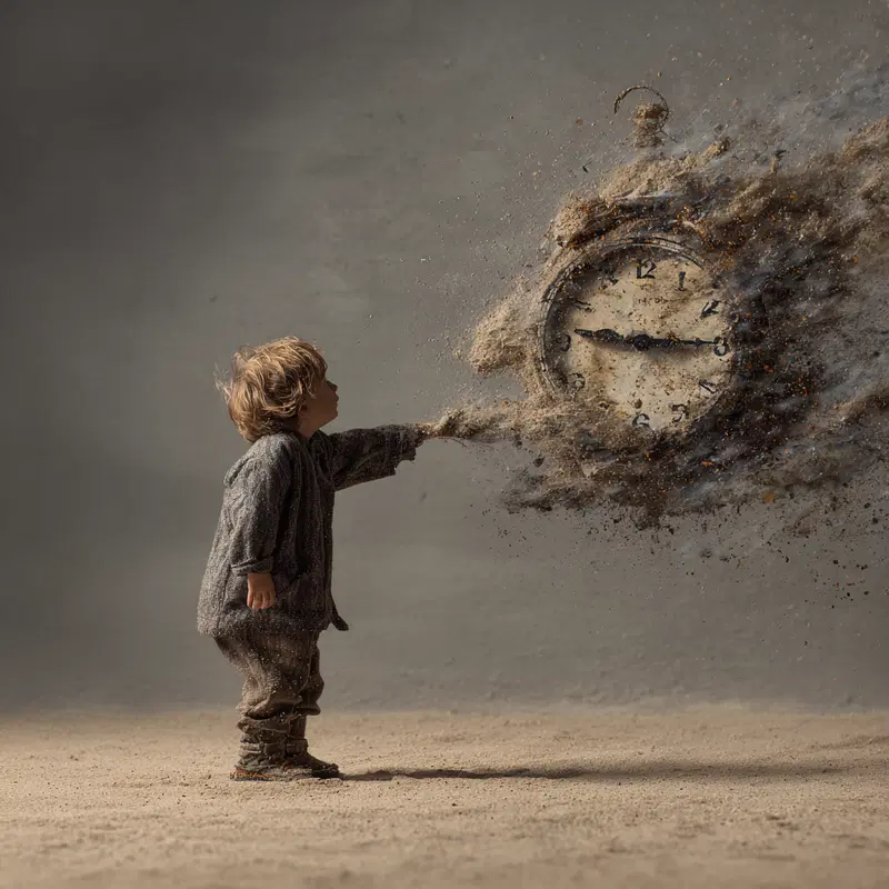 Surreal image of a child reaching out to a dissolving vintage clock made of dust