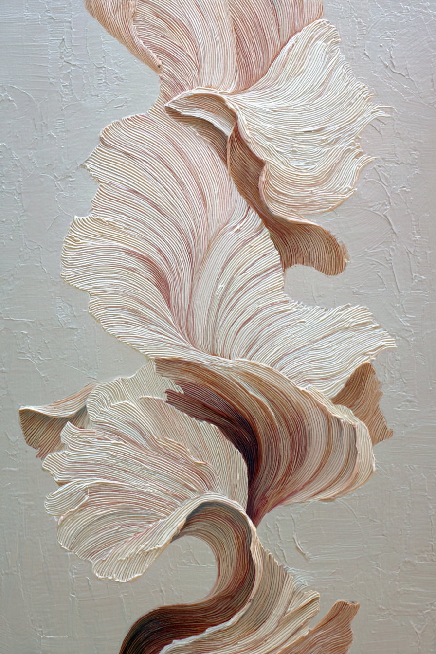 Close-up image of a textured abstract floral painting with flowing beige and cream lines on a light background