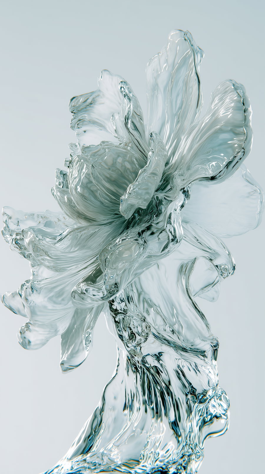 Close-up of a translucent glass sculpture shaped like a detailed flower with petals and a stem against a light background