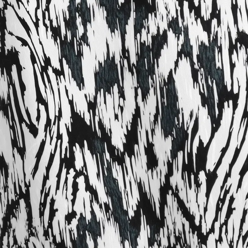 Abstract black and white pattern with dynamic brushstroke style design