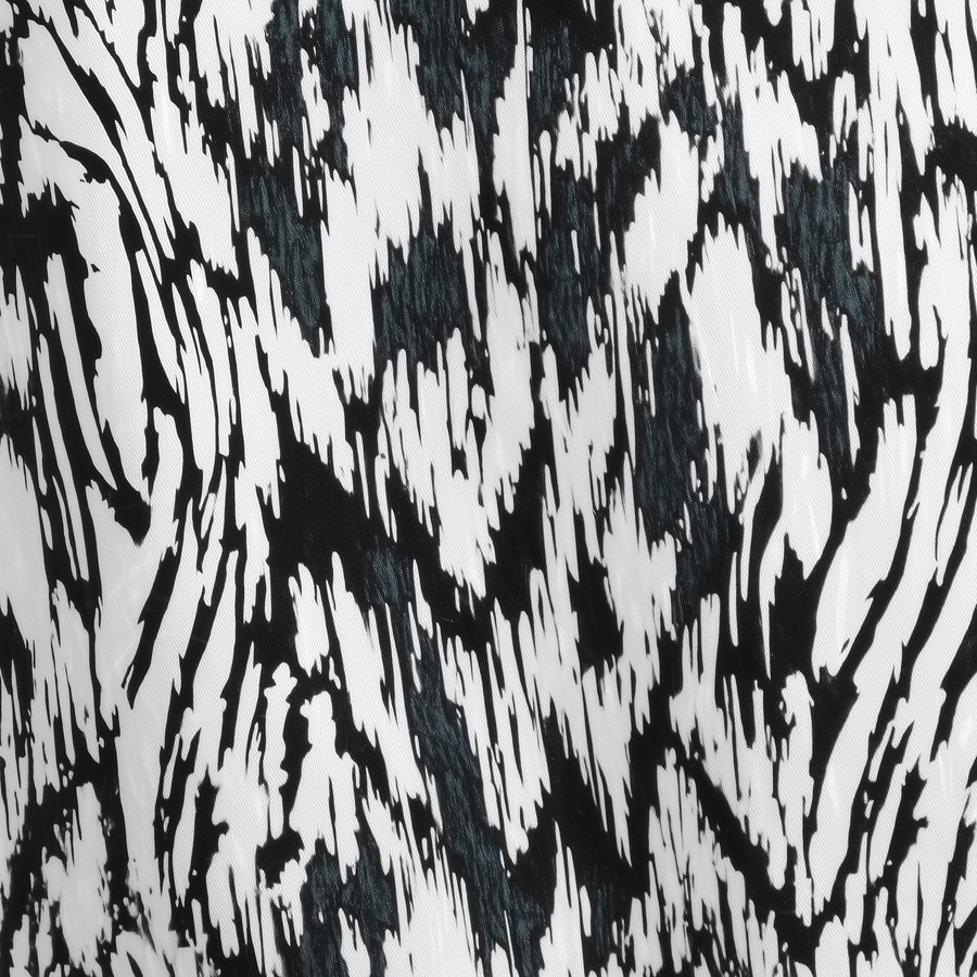 Black and white abstract print with irregular brushstroke shapes and high contrast