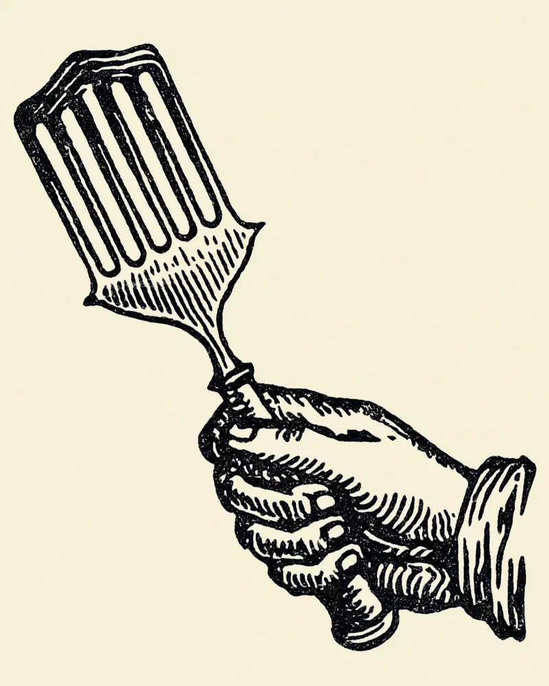 Vintage black and white hand holding a chef's spatula illustration