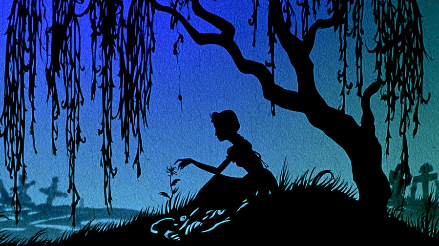 Silhouette of a woman in a gown sitting on grass under a tree with long hanging branches, reaching towards a flower, with a blue and green sky background and faint grave crosses in the distance