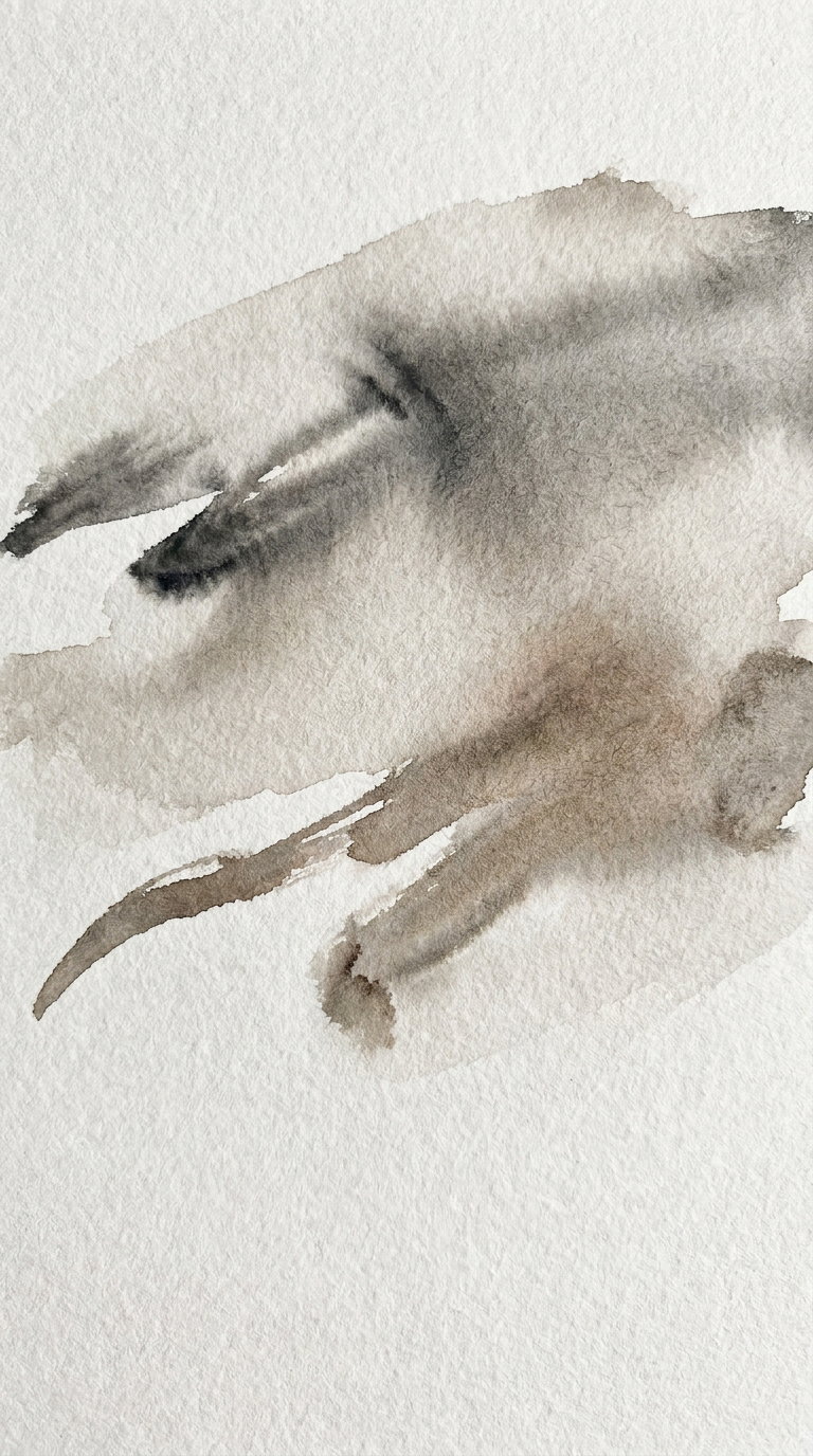 Abstract neutral watercolor brushstrokes in shades of gray and brown on textured white paper