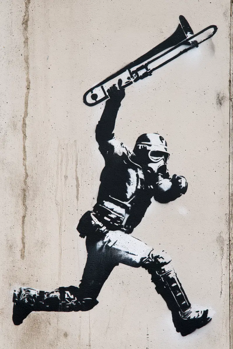 Dynamic Black and White Stencil Art of Protest and Movement