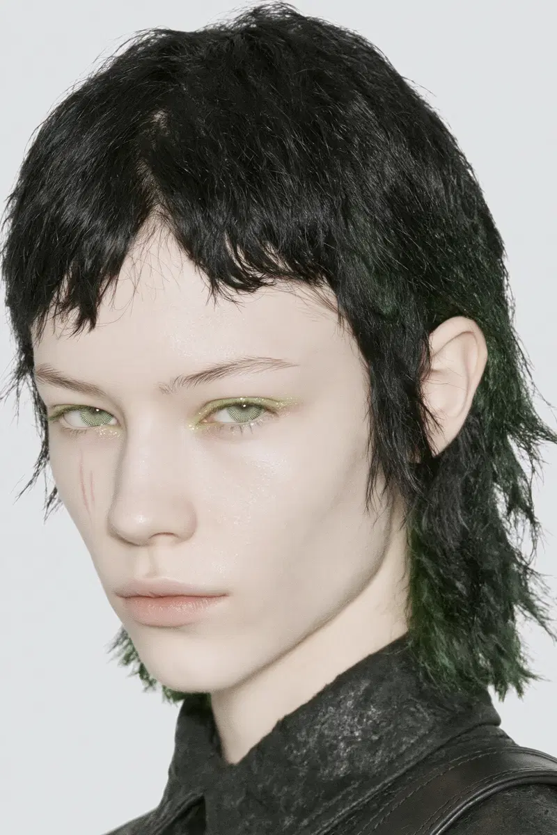 Close-Up Portrait of a Young Woman with Unique Hair and Makeup