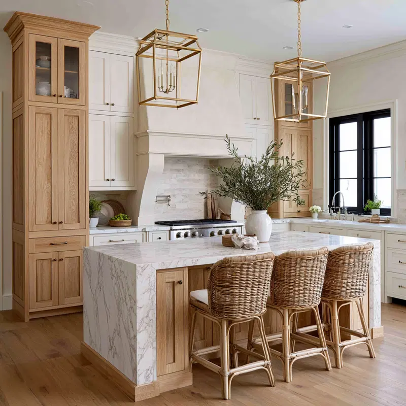 Elegant Kitchen with Cream and White Oak Cabinets and Gold Accents