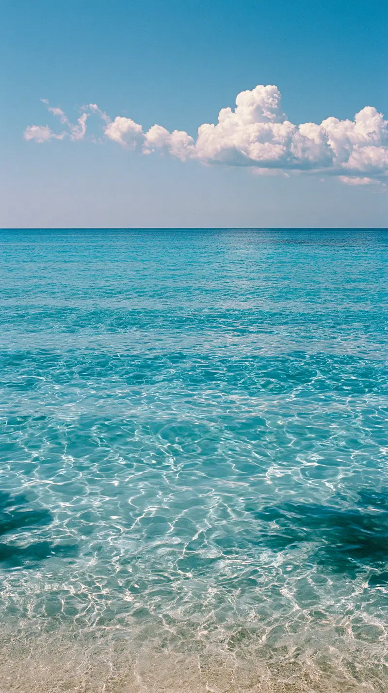 Crystal-Clear Turquoise Sea Under a Bright Blue Sky