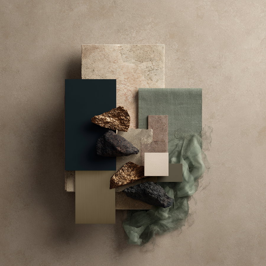 A flat lay arrangement featuring warm beige stone, deep navy matte metal, sage green fabric, bronze gold metallic accents, and ceramic textures.