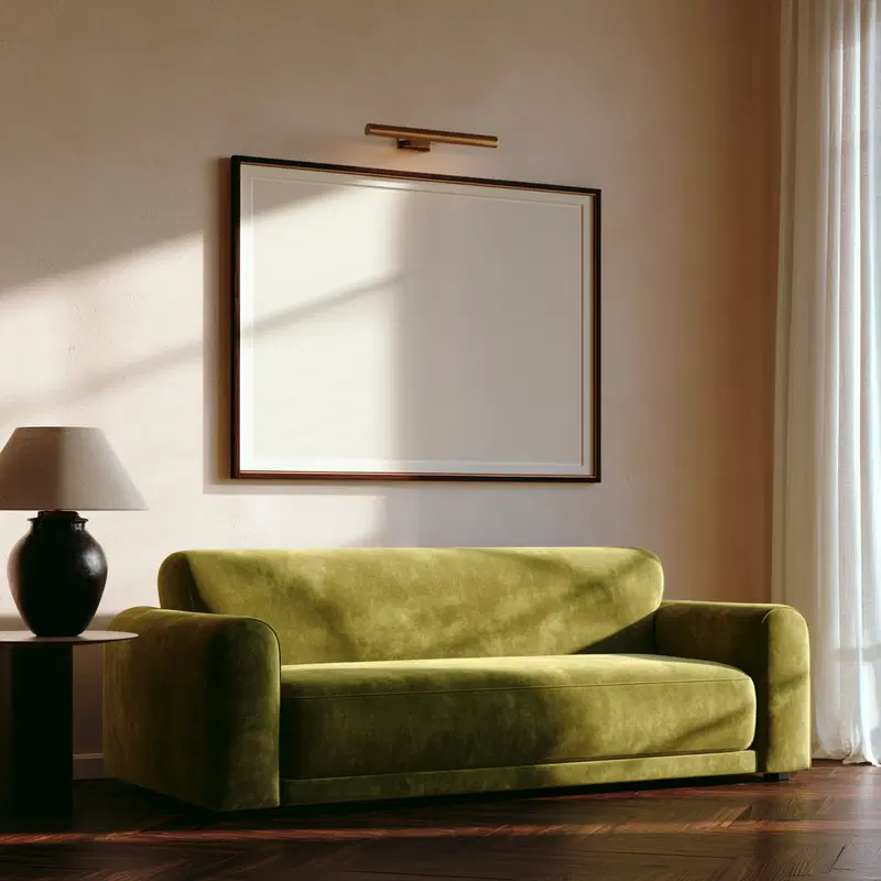 Warm Minimalist Living Room with Olive Velvet Sofa and Blank Frame