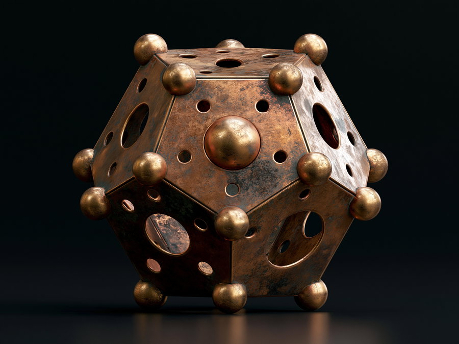 A hollow bronze dodecahedron with twelve pentagonal faces, showing various holes and round protrusions at the corners, against a dark background.