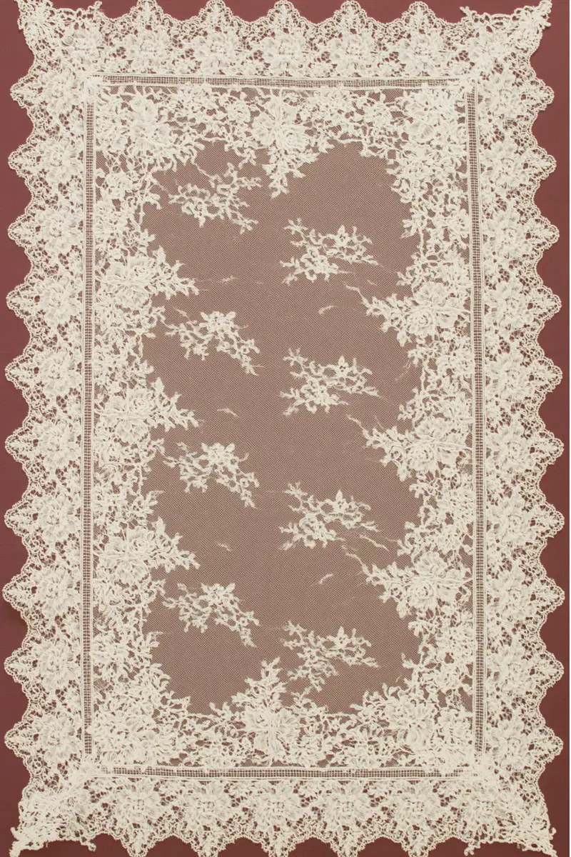 Elegant White Floral Lace on Black Studio Surface