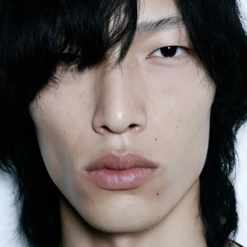 Close-Up Portrait of a Young Japanese Man with Porcelain Skin